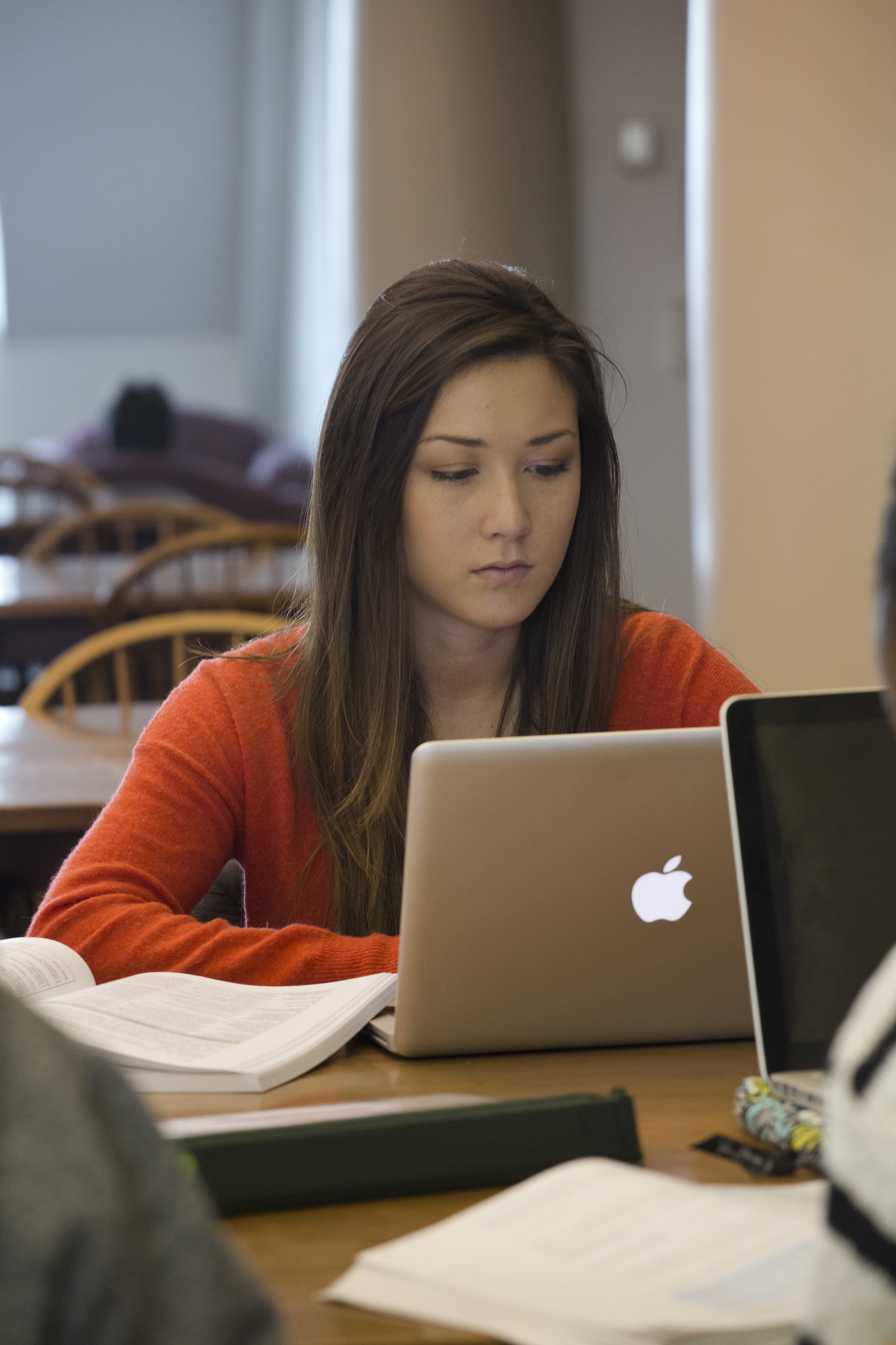 Student studying on a laptop