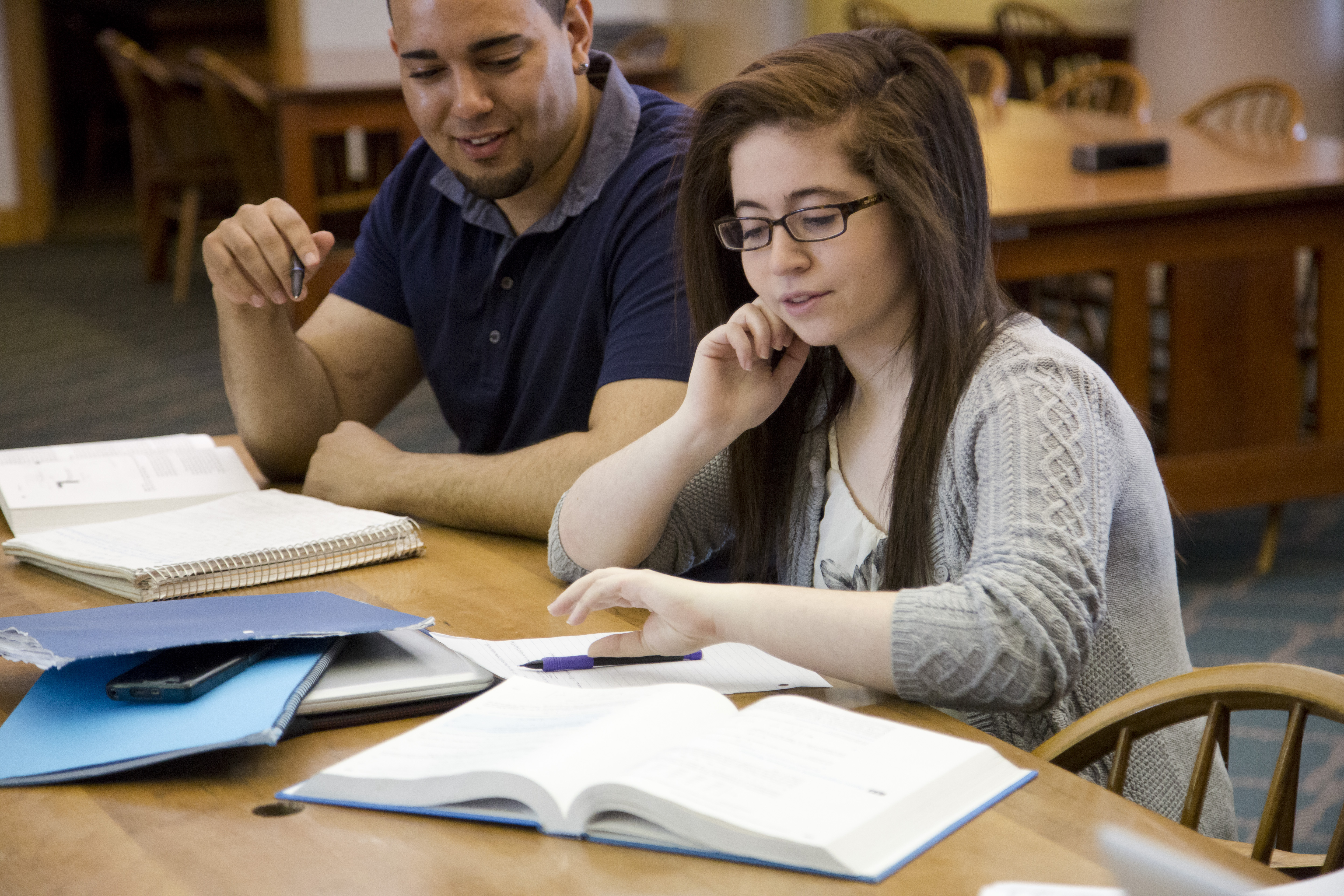 Students studying at Grainger Library